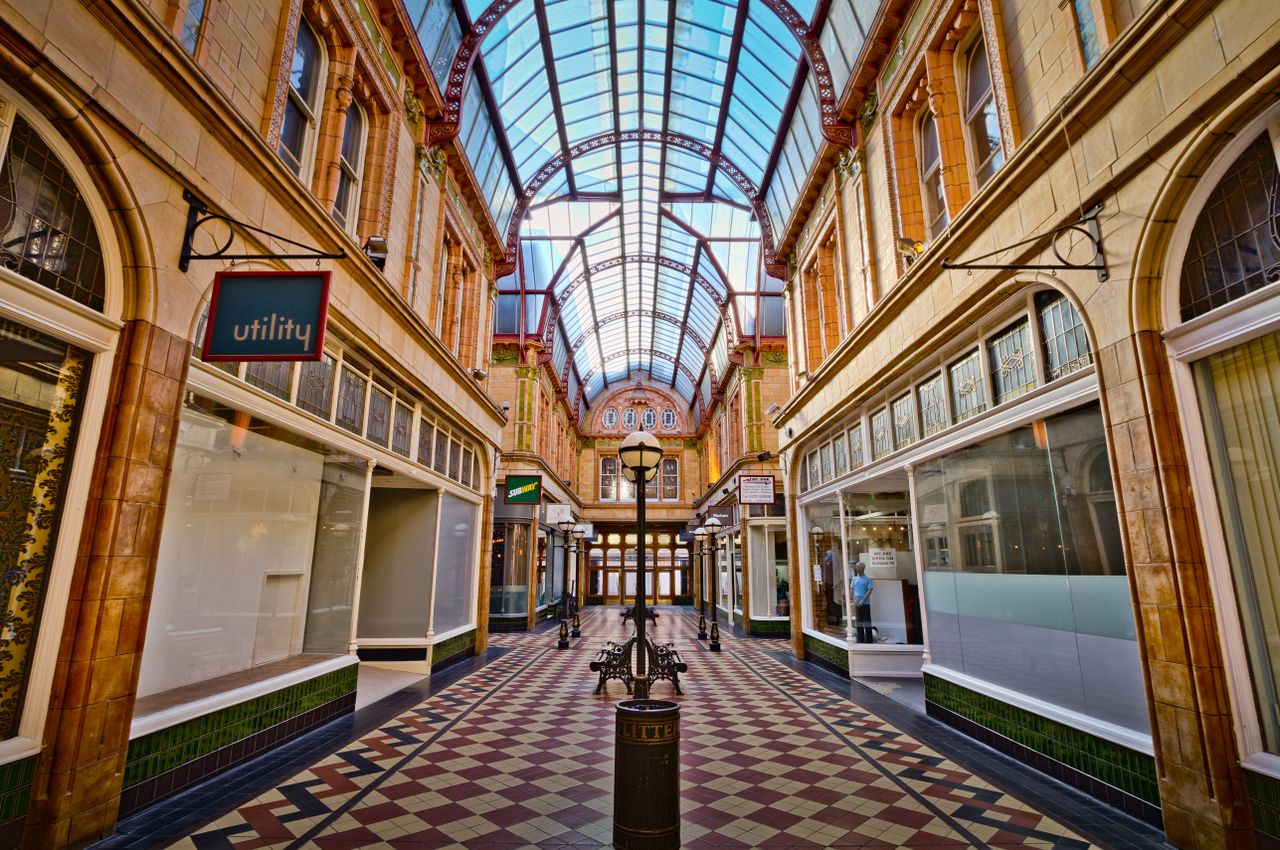 services-03 Explore the historic Victorian shopping arcade in Preston, showcasing stunning architecture.